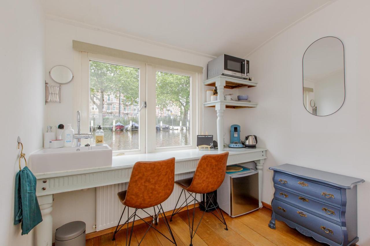 The Houseboat Family - De Jordaan Hotel en barco